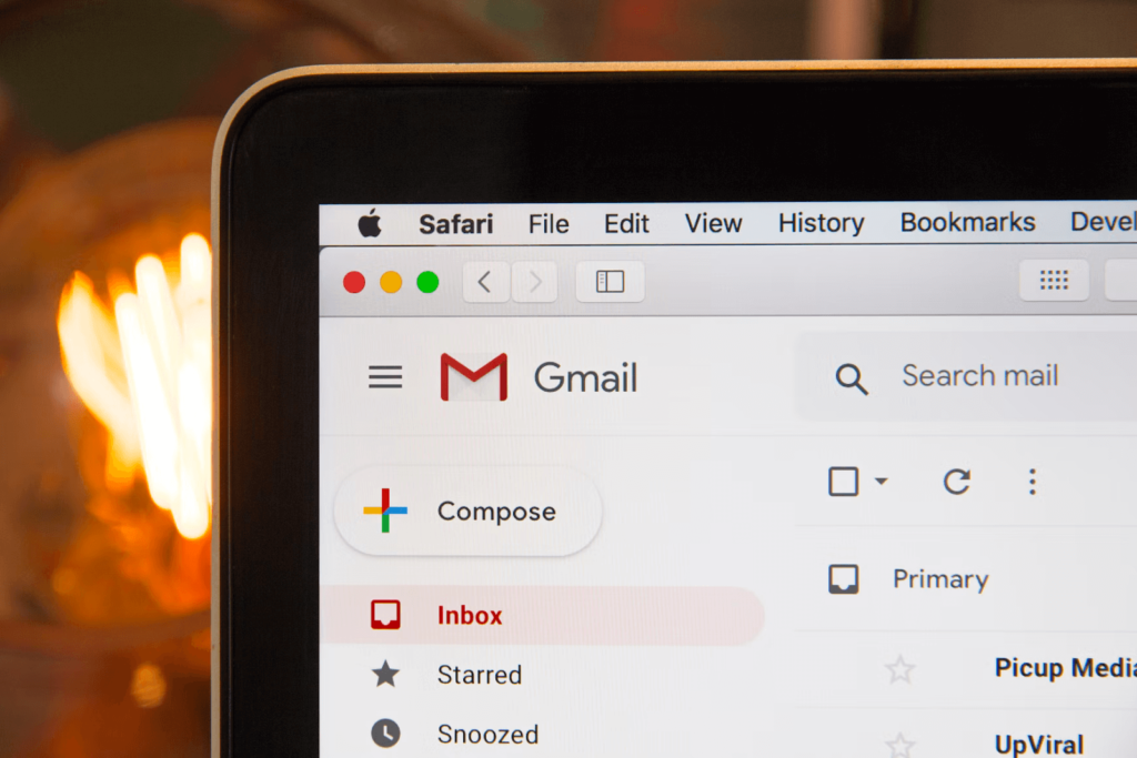  A Gmail tab is opened on a laptop.