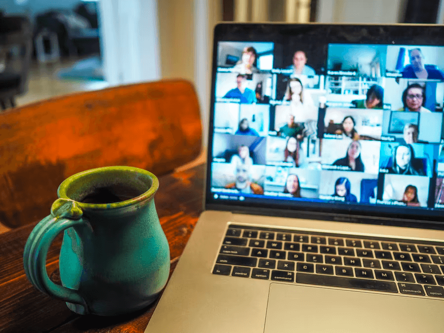 (alt-text: A laptop is open to a Zoom meeting which is allowing a nonprofit to host a virtual fundraising event.) 