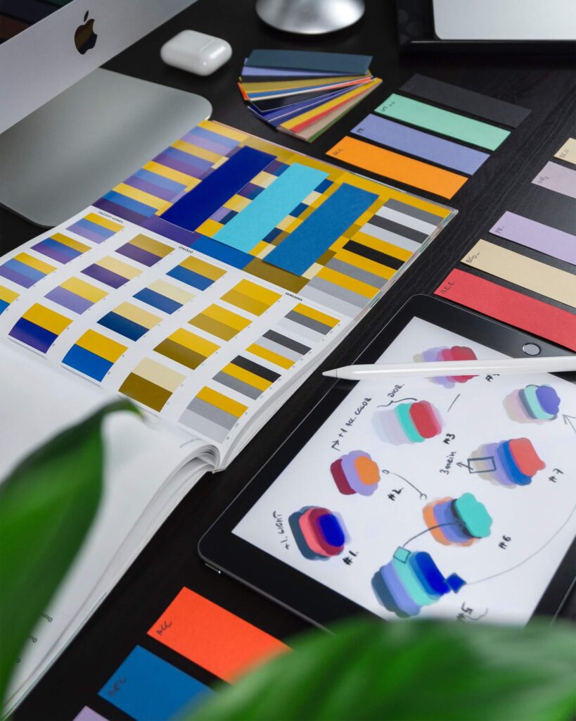 A nonprofit professional works on creating color palettes that suit the nonprofit branding kit. 
