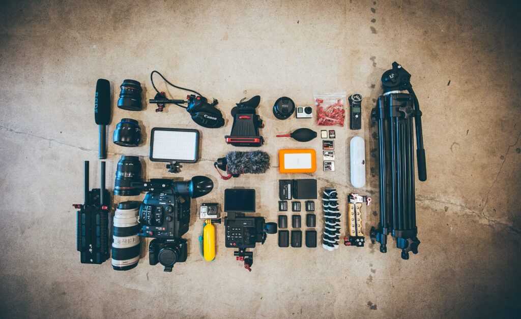 Video marketing tools for nonprofits are laid out for a flat lay photo. 