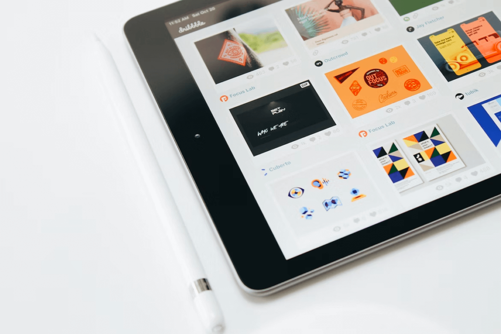 A tablet with graphic designs created in Canva Pro for nonprofits.